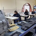 FAMAE y NFM firman un acuerdo para fabricar indumentaria táctica y chalecos balísticos en Chile
